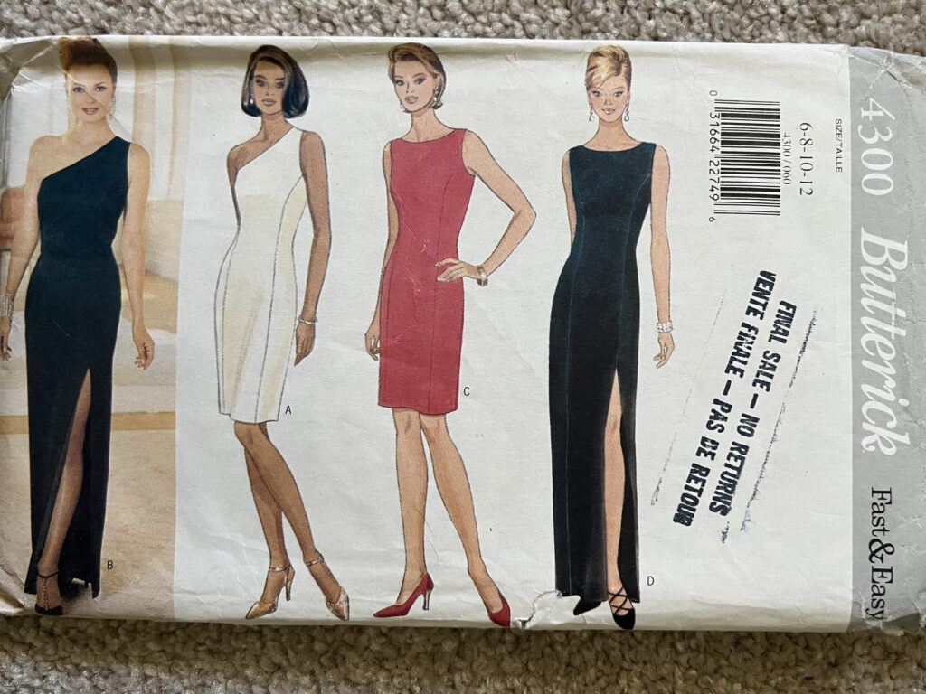 Picture of the Butterick 4300 pattern envelope, featuring images of the four views available. It is a sleeveless princess seam dress with either a boat neck or one shoulder. It is available in knee length and floor length. The floor length has a thigh-high slit.
