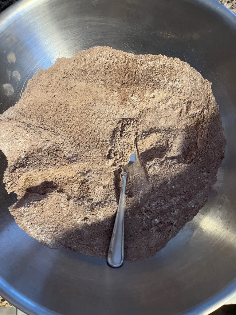 Cake dry ingredients in a mixing bowl.