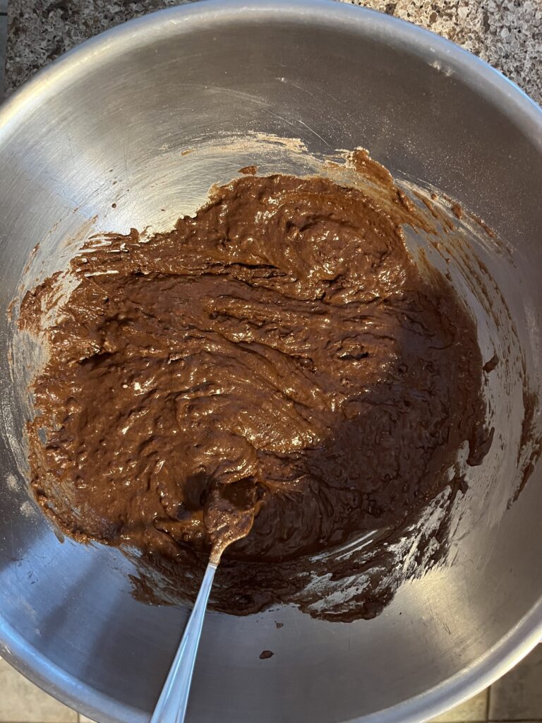Cake batter in a mixing bowl.