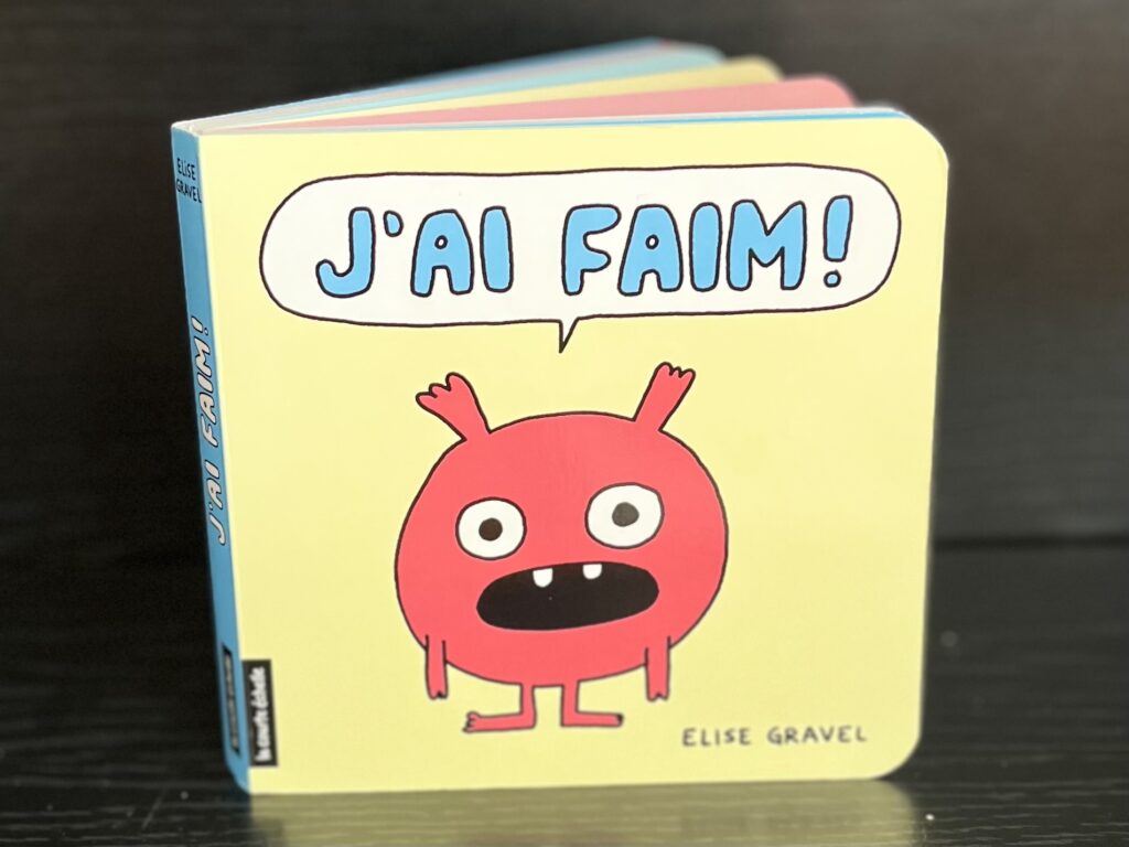 Close-up of the French-language board book J'ai Faim