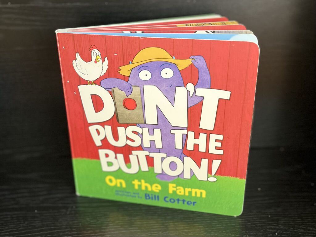 Close-up of the board book Don't Push the Button On The Farm